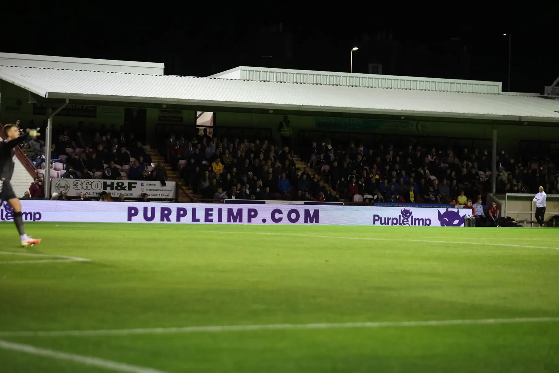 A Purple Imp pitchside LED board at a Scottish football ground